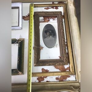Start your gallery wall with this OLD gold ornate wooden frame